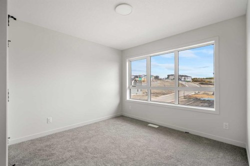 46 Heritage Heath, Cochrane, AB - Indoor Photo Showing Other Room