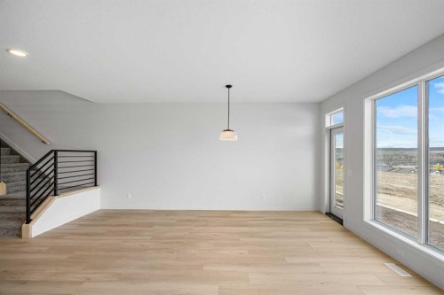 46 Heritage Heath, Cochrane, AB - Indoor Photo Showing Other Room