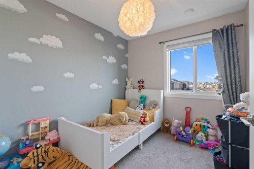 128 Livingston Parade Ne, Calgary, AB - Indoor Photo Showing Bedroom