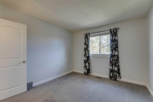 108 Sunbank Way Se, Calgary, AB - Indoor Photo Showing Other Room