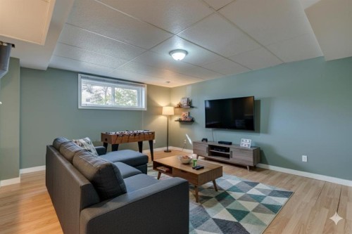 108 Sunbank Way Se, Calgary, AB - Indoor Photo Showing Living Room