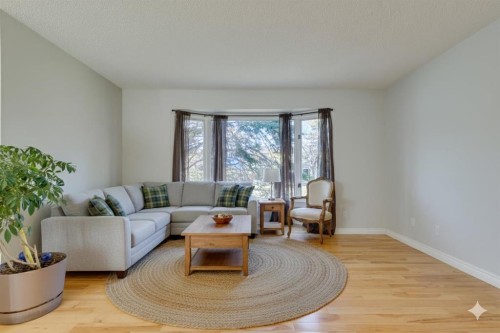 108 Sunbank Way Se, Calgary, AB - Indoor Photo Showing Living Room