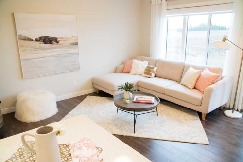 27 Heritage Heath, Cochrane, AB - Indoor Photo Showing Living Room