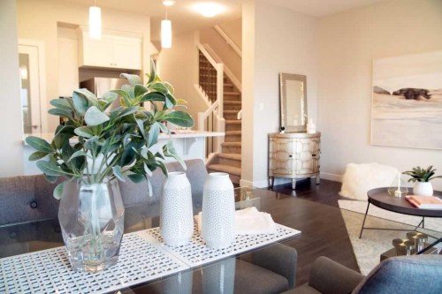 27 Heritage Heath, Cochrane, AB - Indoor Photo Showing Living Room
