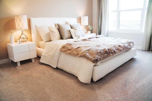 27 Heritage Heath, Cochrane, AB - Indoor Photo Showing Bedroom