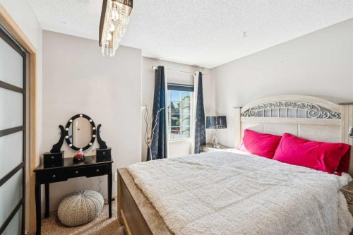 26 Mt Robson Close Se, Calgary, AB - Indoor Photo Showing Bedroom