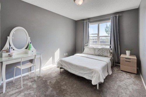 244 Prestwick Avenue Se, Calgary, AB - Indoor Photo Showing Bedroom