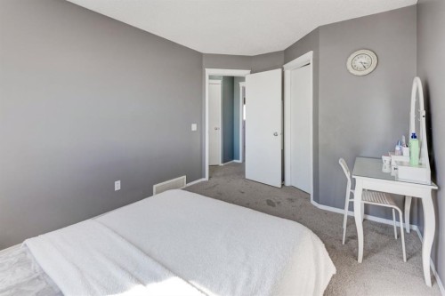 244 Prestwick Avenue Se, Calgary, AB - Indoor Photo Showing Bedroom