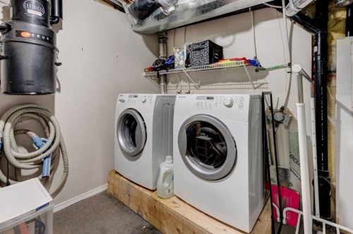 244 Prestwick Avenue Se, Calgary, AB - Indoor Photo Showing Laundry Room