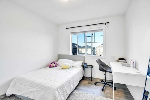 1449 Bayview Point Sw, Airdrie, AB - Indoor Photo Showing Bedroom