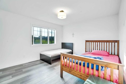 1449 Bayview Point Sw, Airdrie, AB - Indoor Photo Showing Bedroom