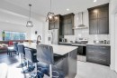 1449 Bayview Point Sw, Airdrie, AB  - Indoor Photo Showing Kitchen With Upgraded Kitchen 