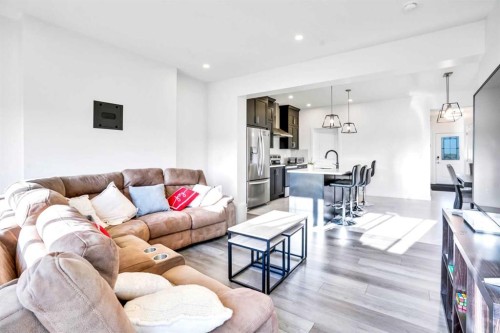1449 Bayview Point Sw, Airdrie, AB - Indoor Photo Showing Living Room
