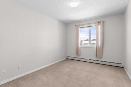 308-1010 Railway Street, Crossfield, AB - Indoor Photo Showing Other Room