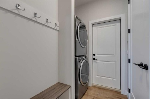 135 Sage Meadows View Nw, Calgary, AB - Indoor Photo Showing Laundry Room