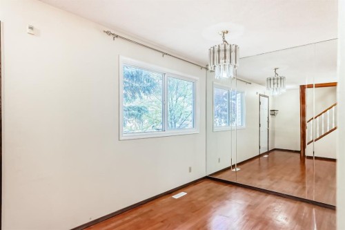 93-6100 4 Avenue Ne, Calgary, AB - Indoor Photo Showing Other Room