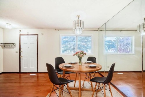 93-6100 4 Avenue Ne, Calgary, AB - Indoor Photo Showing Dining Room