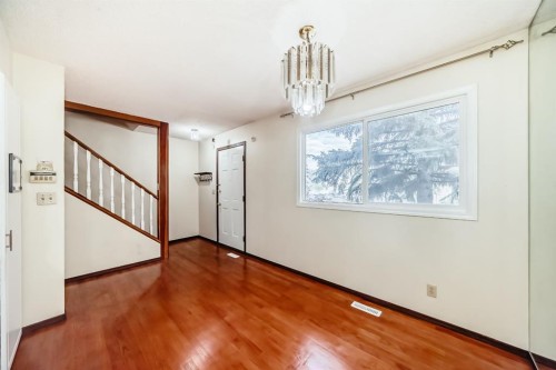 93-6100 4 Avenue Ne, Calgary, AB - Indoor Photo Showing Other Room