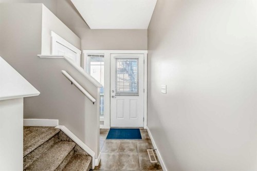 33 Cimarron Vista Gardens, Okotoks, AB - Indoor Photo Showing Other Room