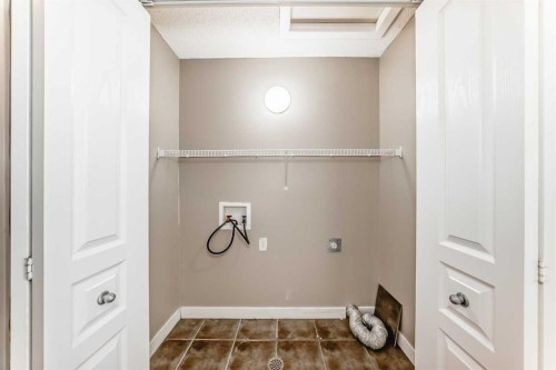 33 Cimarron Vista Gardens, Okotoks, AB - Indoor With Storage