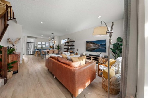 237 Walden Parade Se, Calgary, AB - Indoor Photo Showing Living Room With Fireplace
