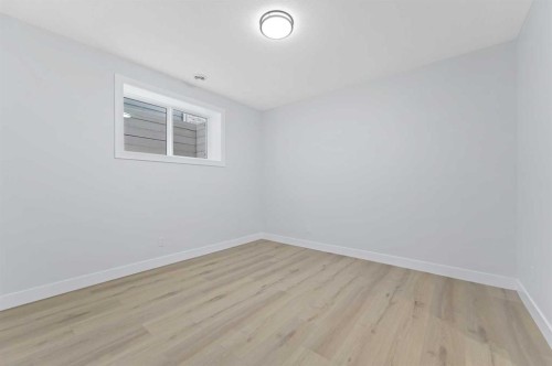 107 Hartford Road Nw, Calgary, AB - Indoor Photo Showing Other Room