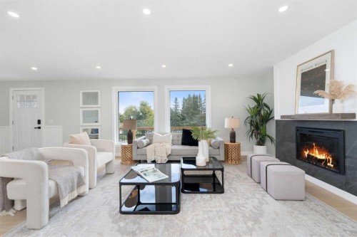 328 Cantrell Place Sw, Calgary, AB - Indoor Photo Showing Living Room With Fireplace