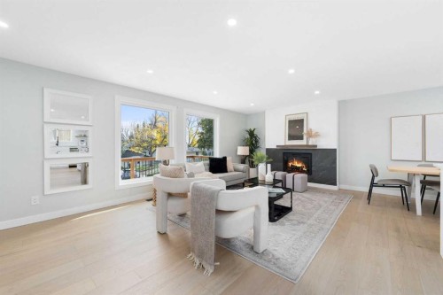 328 Cantrell Place Sw, Calgary, AB - Indoor With Fireplace