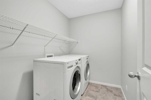 106 Lucas Crescent Nw, Calgary, AB - Indoor Photo Showing Laundry Room