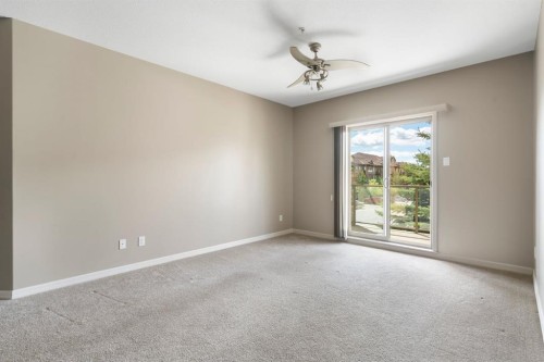4214-92 Crystal Shores Road, Okotoks, AB - Indoor Photo Showing Other Room