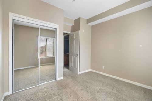 4214-92 Crystal Shores Road, Okotoks, AB - Indoor Photo Showing Other Room