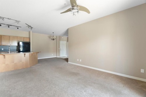 4214-92 Crystal Shores Road, Okotoks, AB - Indoor Photo Showing Kitchen