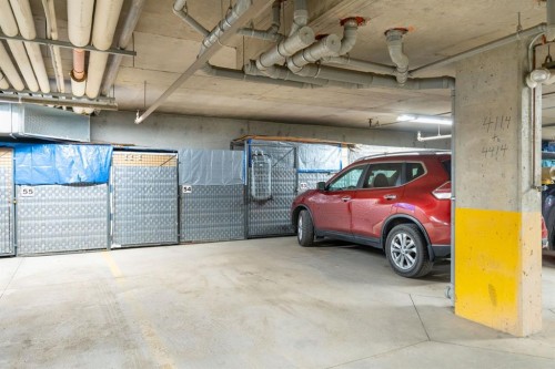 4214-92 Crystal Shores Road, Okotoks, AB - Indoor Photo Showing Garage