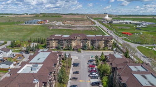4214-92 Crystal Shores Road, Okotoks, AB - Outdoor With View