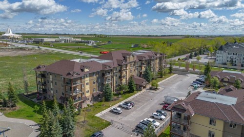 4214-92 Crystal Shores Road, Okotoks, AB - Outdoor With View