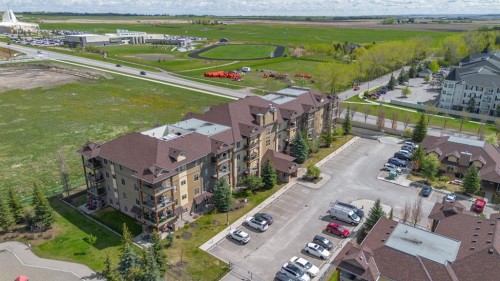 4214-92 Crystal Shores Road, Okotoks, AB - Outdoor With View