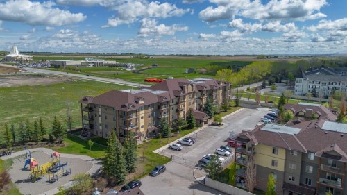 4214-92 Crystal Shores Road, Okotoks, AB - Outdoor With View