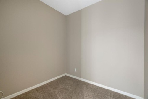 4214-92 Crystal Shores Road, Okotoks, AB - Indoor Photo Showing Other Room