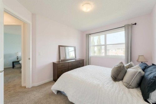 271 River Heights Crescent, Cochrane, AB - Indoor Photo Showing Bedroom