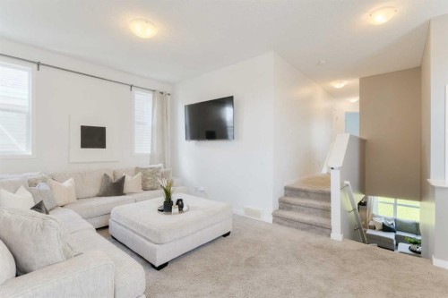 271 River Heights Crescent, Cochrane, AB - Indoor Photo Showing Living Room