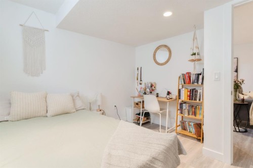 271 River Heights Crescent, Cochrane, AB - Indoor Photo Showing Bedroom