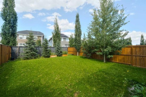 271 River Heights Crescent, Cochrane, AB - Outdoor With Backyard