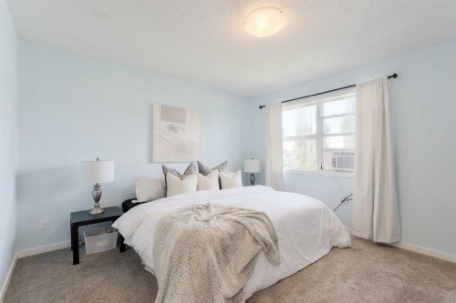 271 River Heights Crescent, Cochrane, AB - Indoor Photo Showing Bedroom