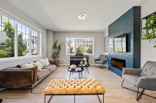 19 Yorkville Gate Sw, Calgary, AB - Indoor Photo Showing Living Room With Fireplace