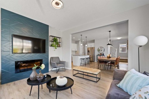 19 Yorkville Gate Sw, Calgary, AB - Indoor Photo Showing Living Room With Fireplace