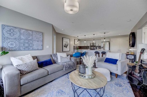 210-5029 Edgemont Boulevard Nw, Edmonton, AB - Indoor Photo Showing Living Room