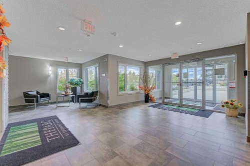 210-5029 Edgemont Boulevard Nw, Edmonton, AB - Indoor Photo Showing Other Room