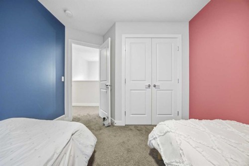 520 Kingsmere Way Se, Airdrie, AB - Indoor Photo Showing Bedroom