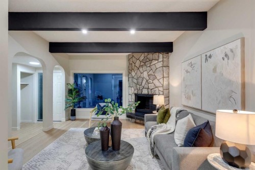 4-7166 18 Street Se, Calgary, AB - Indoor With Fireplace