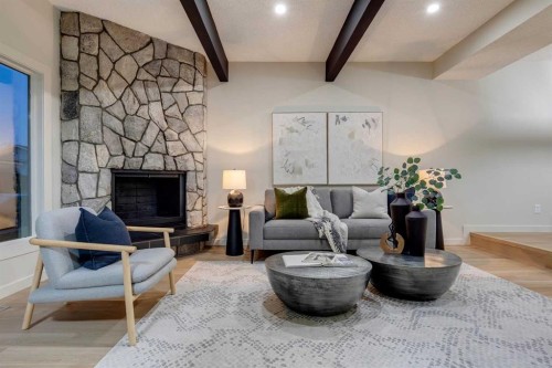 4-7166 18 Street Se, Calgary, AB - Indoor Photo Showing Living Room With Fireplace